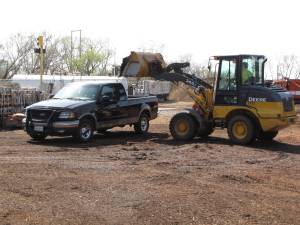 1 Dallas yard - loader loading a customers truck-min